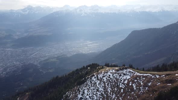Picturesque View From The Peak Of Nordkette Mountain In Tyrol, Innsbruck, Austria On A Misty Day. ae alt