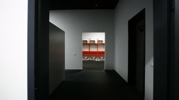 Camera Flight Forward Along the White Corridor to the Sports Locker Room alt