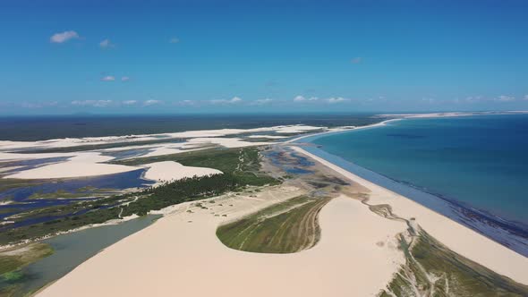 Jericoacoara Ceara Brazil. Scenic sand dunes and turquoise rainwater lakes alt