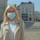 Beautiful Blond Girl Wearing Medical Mask During Coronavirus in the Center of an Empty City COVID-19 - VideoHive Item for Sale