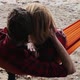 Happy Girlfriend Relaxing with Boyfriend in Hammock - VideoHive Item for Sale