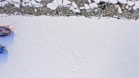 Icebreakers crush ice on Vistula river. Nature in winter, Poland. alt