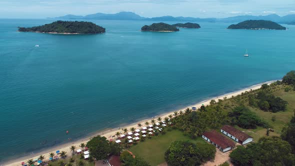 Paraty bay water. Beach landmark travel destination in Brazil. alt