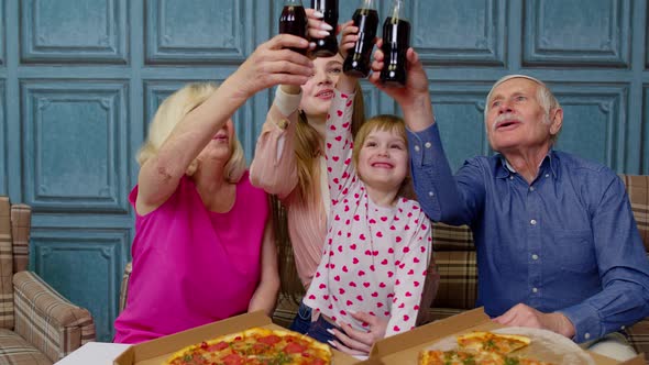 Multigenerational Family Having Lunch Party Eating Pizza Food Laughing Raising Toast at Home alt