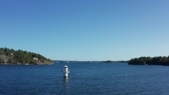 Flying across water in Stockholm Archipelago, Scandinavia, Northern Europe alt