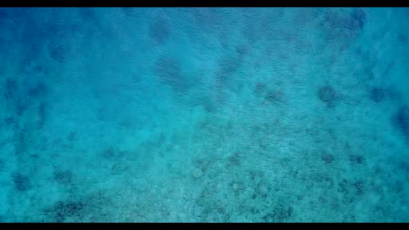 Aerial above texture of relaxing tourist beach vacation by blue lagoon and white sand background of  alt