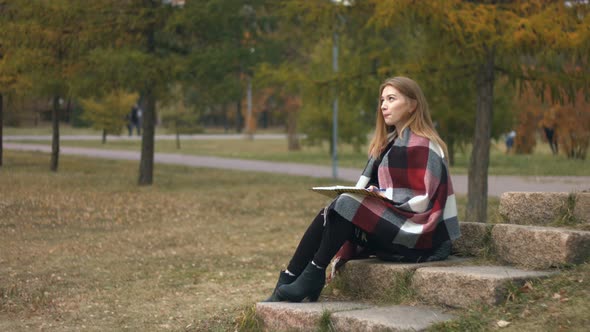 Girl in Autumn Park