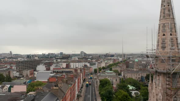 Forwards Fly Above Town Around Tower of Abbey Presbyterian Church to Ambassador Theatre with View of alt