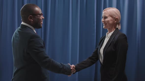 Modern Candidates For Presidency Shaking Hands alt