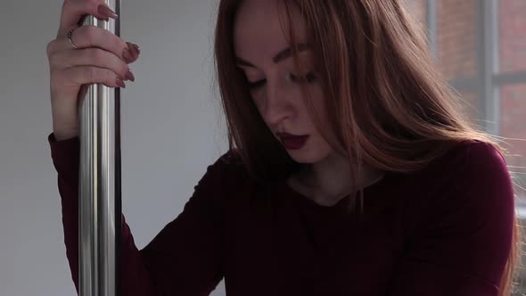 Sexy Young Woman Dancing Near Pole alt