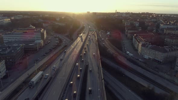 Aerial View of Elevated Highway Traffic at Sunset