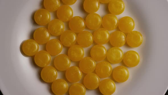 Rotating shot of butterscotch candies - CANDY BUTTERSCOTCH 031 alt