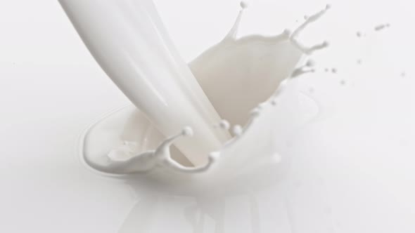 Super Slow Motion Shot of Pouring and Splashing Fresh Cream at 1000 Fps alt