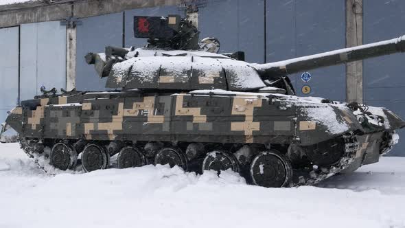 Tank of the Ukrainian Army Stands at the Hangar