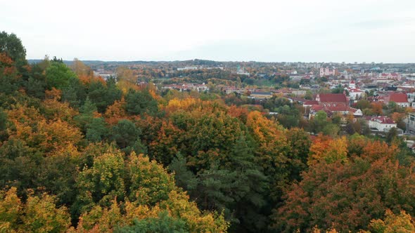 AERIAL: Reveal Shot of Vilnius City Panorama in Autumn with Dull Sky in Background
