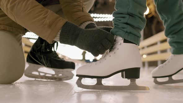 Tying Shoelaces On Ice Skates alt