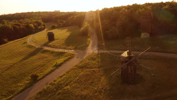 White Green Countryside Field with Mills and Trees alt
