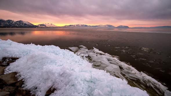 Sunrise Over Lake as the Ice is Melting alt