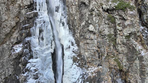 Streams of Water Flow Down From the Cliff