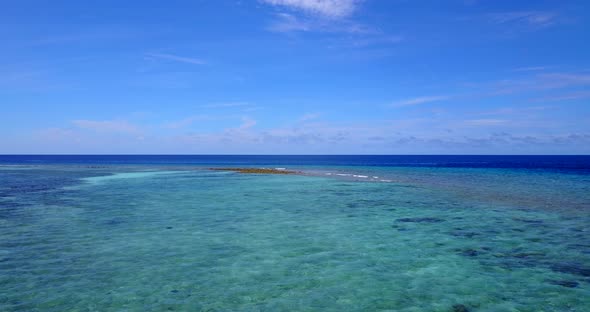 Beautiful above abstract shot of a white sand paradise beach and turquoise sea background in hi res  alt