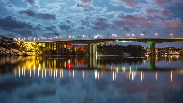 Bridge over river at night 4K Time Lapse