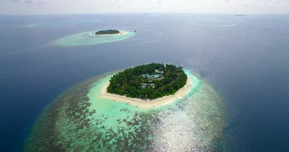 Aerial drone view of scenic tropical islands in the Maldives. alt
