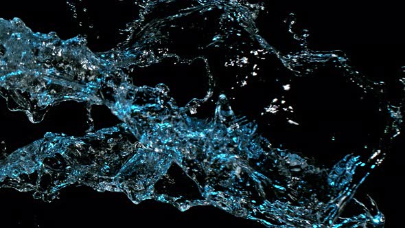 Super Slow Motion Shot of Water Splash on Black Background at 1000Fps. alt