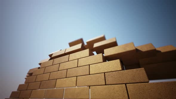 A brick by brick wall building animation. Filled with bright cement. HD alt