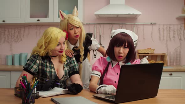 Pretty Diverse Multiethnic Women in Cosplay Costumes Discussing Performance alt