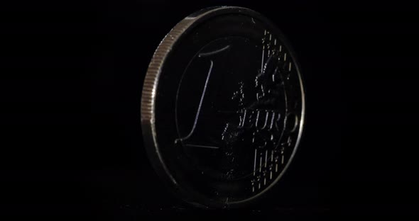 4K - Euro coin rotate on black background alt