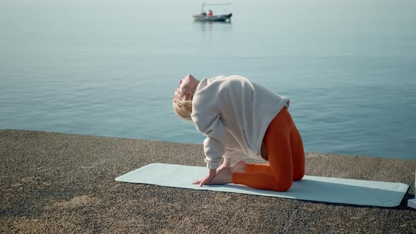 Serenity Happy Life Woman Doing Morning Yoga Practice on the Sea