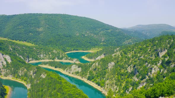 Winding Blue River Meandri Cehotine on the Mountains with Green Forest in Pljevlja Montenegro alt