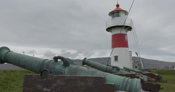 Wide Pan Left of the Skansin Lighthouse in Torshavn, Faroe Islands alt