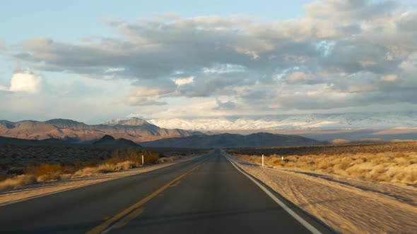Road Trip Driving Auto From Death Valley To Las Vegas Nevada USA