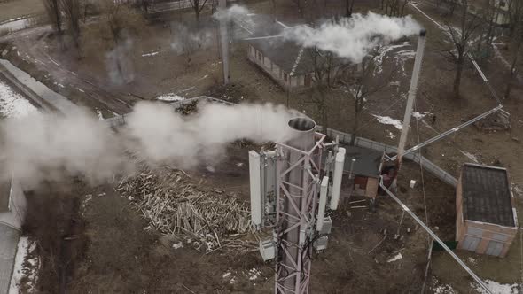 Two Pipes Of A Small Wood Fired Boiler House alt