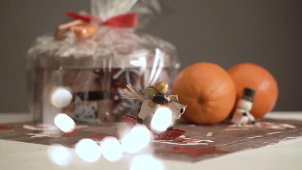 Slow motion little see-saw horse with Christmas mood and two random moving lighting sparklers. alt