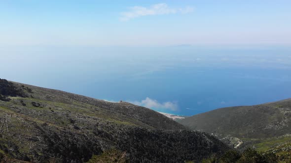 Aerial View From Llogara Pass to Albanian Riviera Beach Clouds and Ionian Sea Coastline alt
