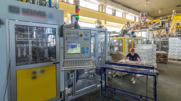 A Factory for Plastic Canister Production Timelapse Hyperlapse. The Conveyor in the Factory. alt