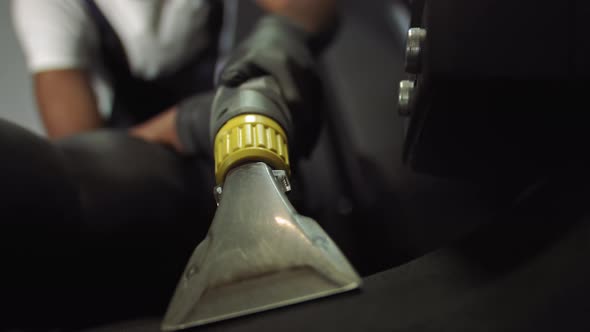Shooting Close Up of a Professional Vacuum Cleaner To Clean the Mat a Man Cleans alt