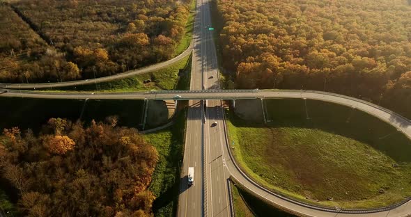 Autumn Aerial View of Highway Road Junction in the Countryside with Trees alt
