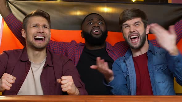 Multiracial Sports Fans Waving German Flag, Upset About National Team Losing alt