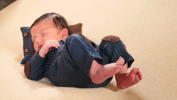 Childhood, Infancy, Parenthood, Motherhood. Adorable and Cute 10-Days Newborn Baby Boy Lying on alt