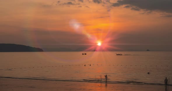 Time-lapse of Light Rays Over the Sea or Ocean at Sunset. Hot Summer Weather at Tropical. Panoramic alt