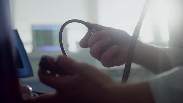 Physician Hands Measure Blood Pressure with Tonometer Unknown Patient Close Up alt