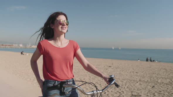 Young Adult Tourist on beach in summer and taking picture