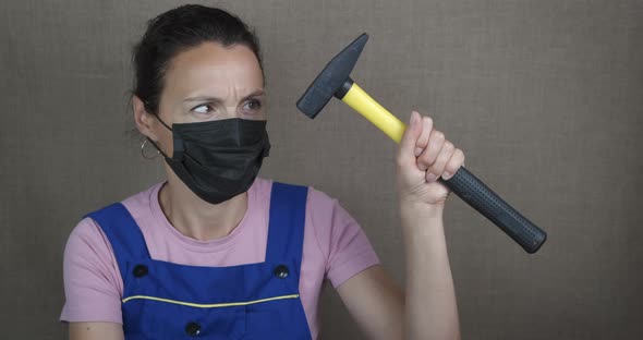 Woman Repair in Protective Mask alt