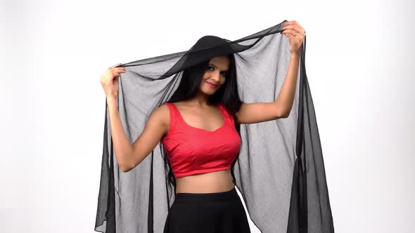 Indian girl playing with dupatta alt