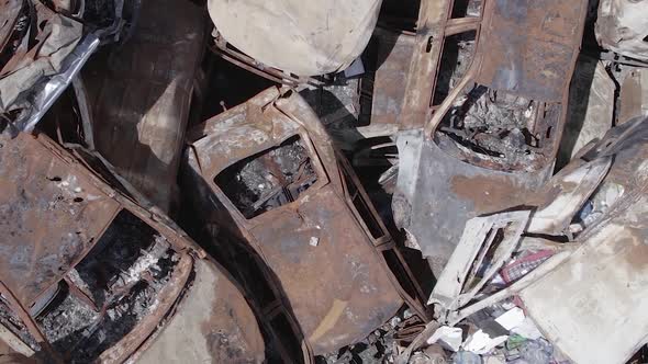 Vertical Video of a Dump of Wardestroyed Cars in Ukraine alt