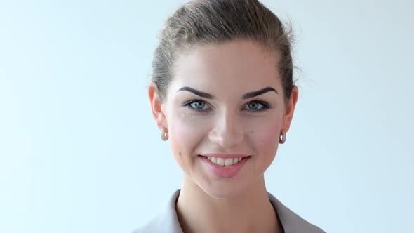 Young Businesswoman Smile to Camera