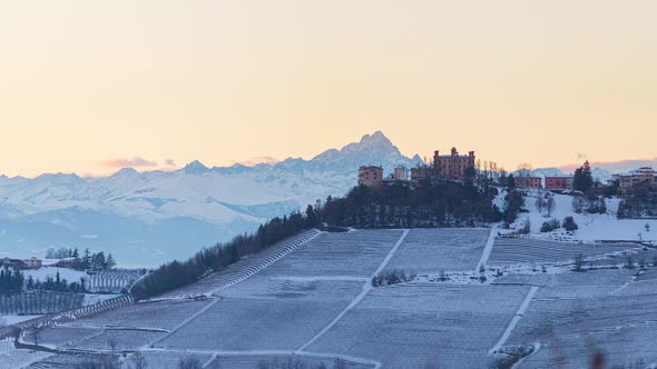 Pan: Italy Piedmont panoramic winter snow view wine yards unique landscape at sunset alt